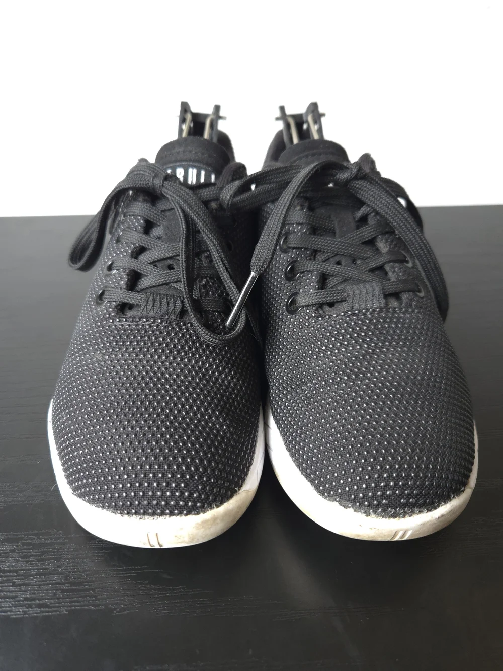 NOBULL Women's Low Top Outwork Black Athletic Shoes with White Midsole 5.5